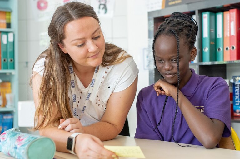 teacher and student in the classroom