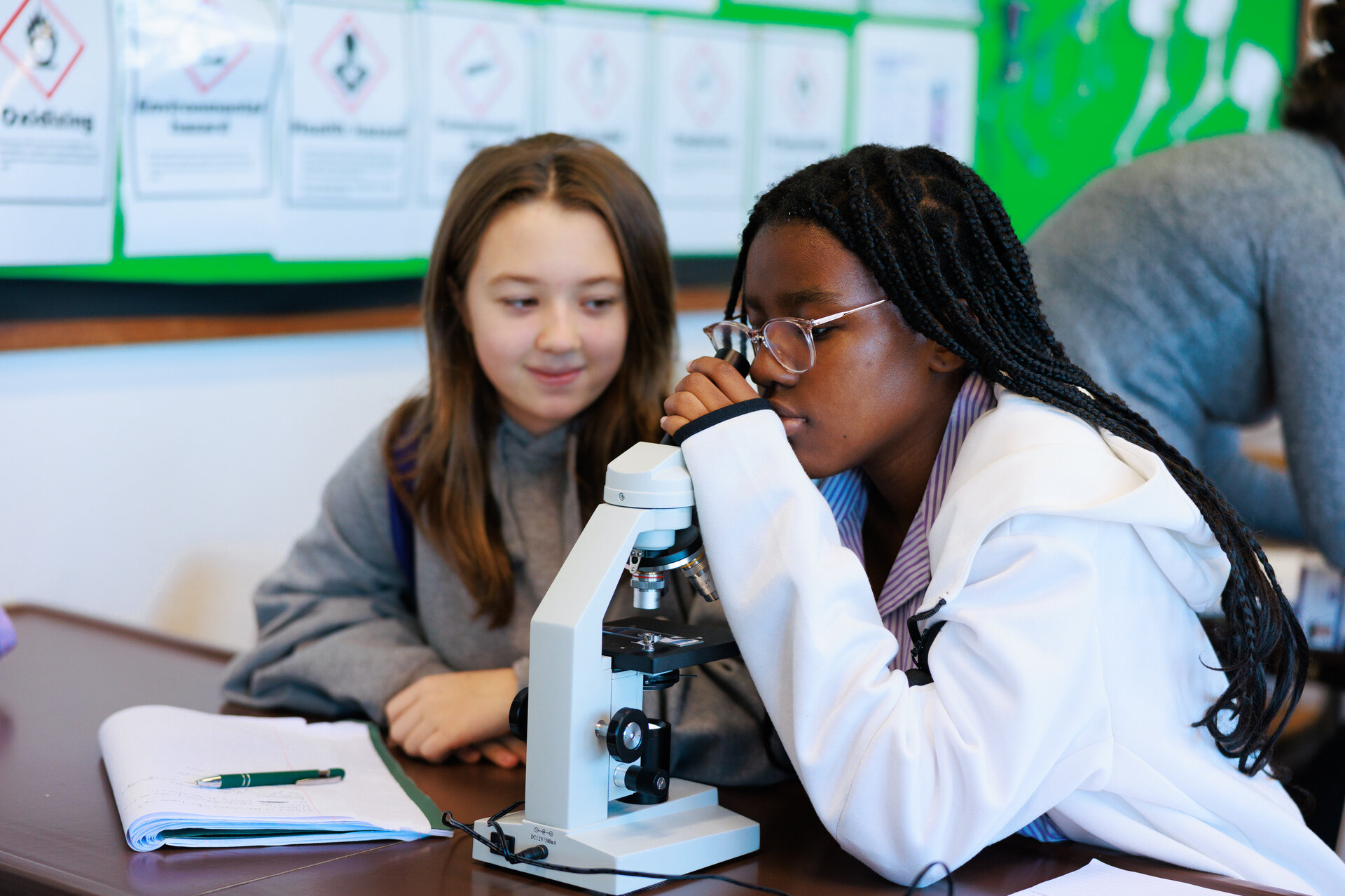 two students at the microscope 