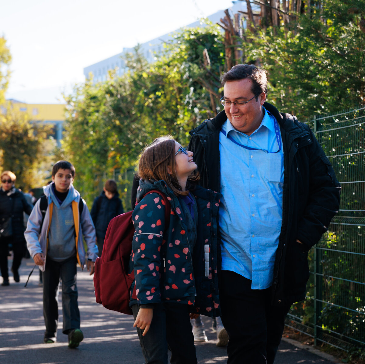 parent and student in the schoolyard